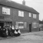 33. Kirks shop with Lois Kirkby and family group; possibly 1900; 580.jpg